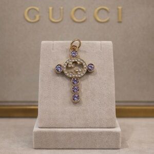 Gucci stamped Gold and Purple Pendant/ charm/ zipper pull w/ crystals in middle